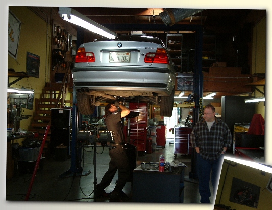 Sam Ramey and Mike replacing a differtential bushing.