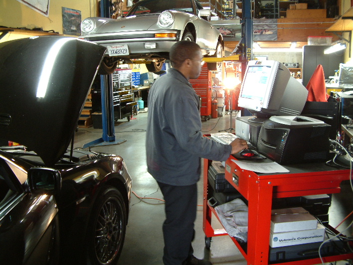 Our BMW specialist, Gerrod Lenzy programming modules with the BMW SSS system. 
